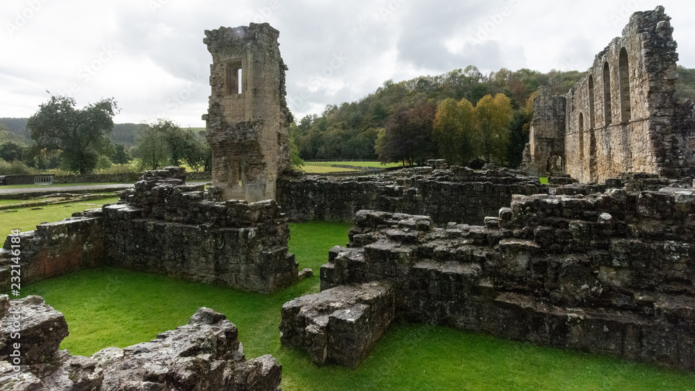 The ruins of the church Abbey. A shell of a building, stone walls and window arches largely intact but no roof