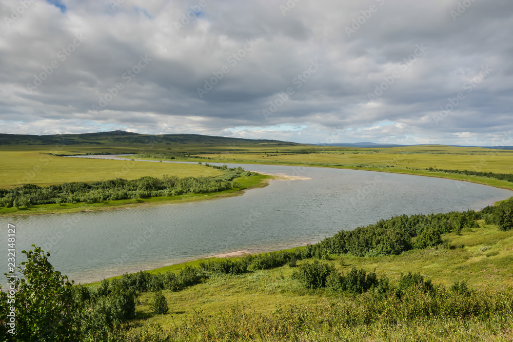 Obraz premium Northern river among tundra.