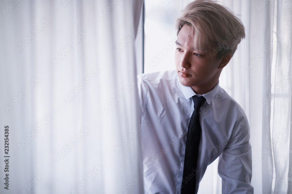 Young Asian businessman in white shirt and tie Young Asian businessman in white shirt and tie