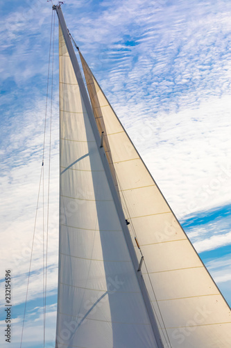 mast with sails and sun at noon, closeup © Milan Noga reco