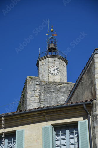 Clock tower in the main square of the medieval village of Uzes in the Gard region of Provence, France
