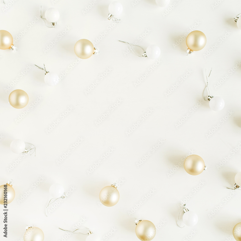 Mockup frame of golden Christmas balls decorations on white background. Flat lay, top view Christmas / New Year holiday composition. Mockup frame of golden Christmas balls decorations on white background. Flat lay, top view Christmas / New Year holiday composition.