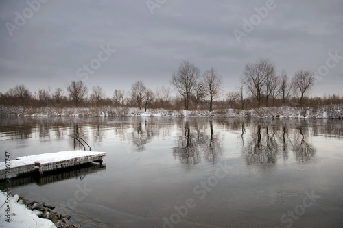 winter landscape with river and trees © szrmaks