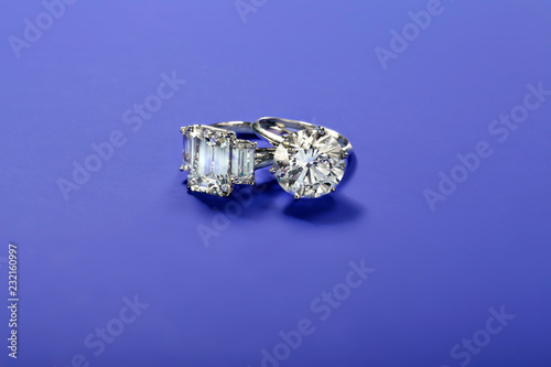 Diamond Rings on Blue Background  © Glass Hat