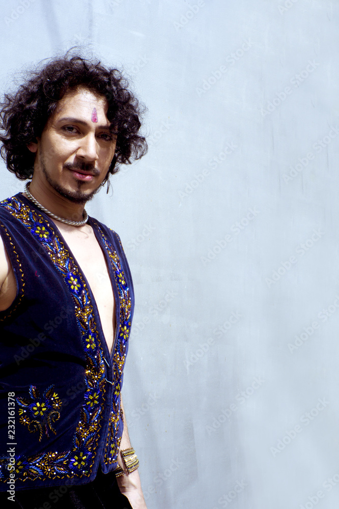 Bollywood dancer with beard and black curly hair Bollywood dancer with beard and black curly hair
