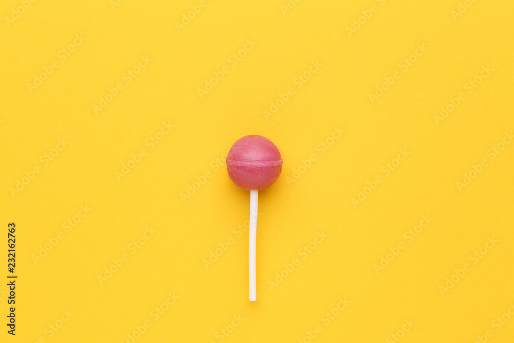 Sweet lollipop on yellow background Sweet lollipop on yellow background
