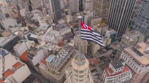 SAO PAULO, BRAZIL - MAY 3, 2018: Aerial View of the city centre Banespa building with city flag