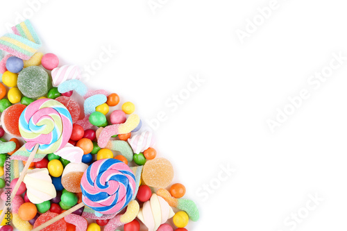 Sweet candies and lollipops on white background