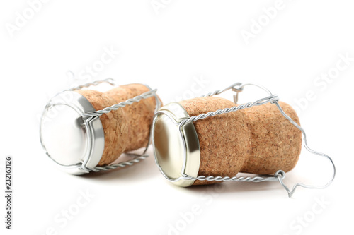 Champagne corks with caps isolated on white background
