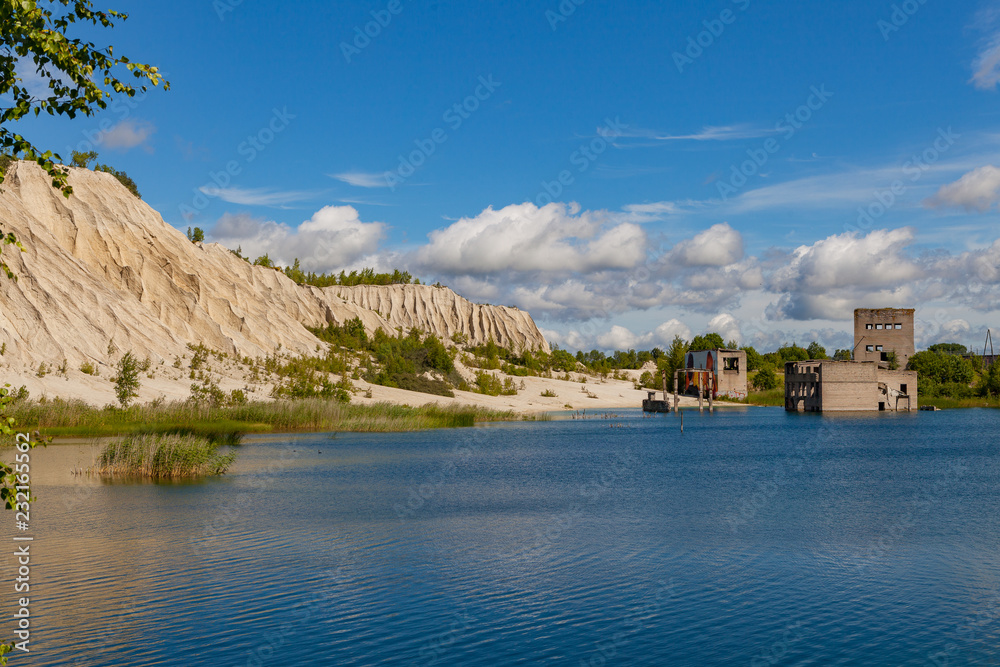 RUMMU, ESTONIA - July, 15, 2017: Sandy hill above the abandoned quarry RUMMU, ESTONIA - July, 15, 2017: Sandy hill above the abandoned quarry