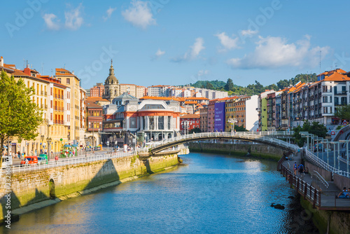 Spain, Basque Country, Bilbao. Nervion river and the Mercado de la Ribera market.