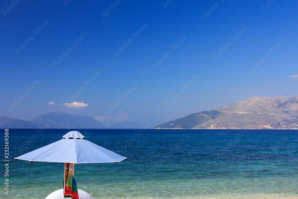 Beach umbrella on a beautiful island