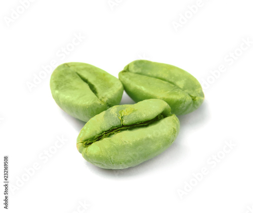 Organic green coffee beans on white background