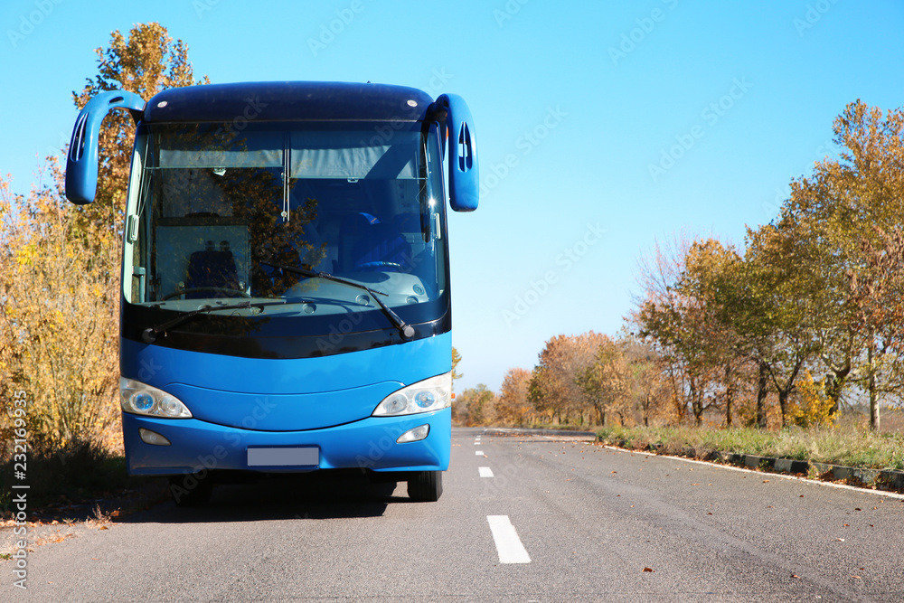 Fototapeta premium Modern blue bus on road. Passenger transportation