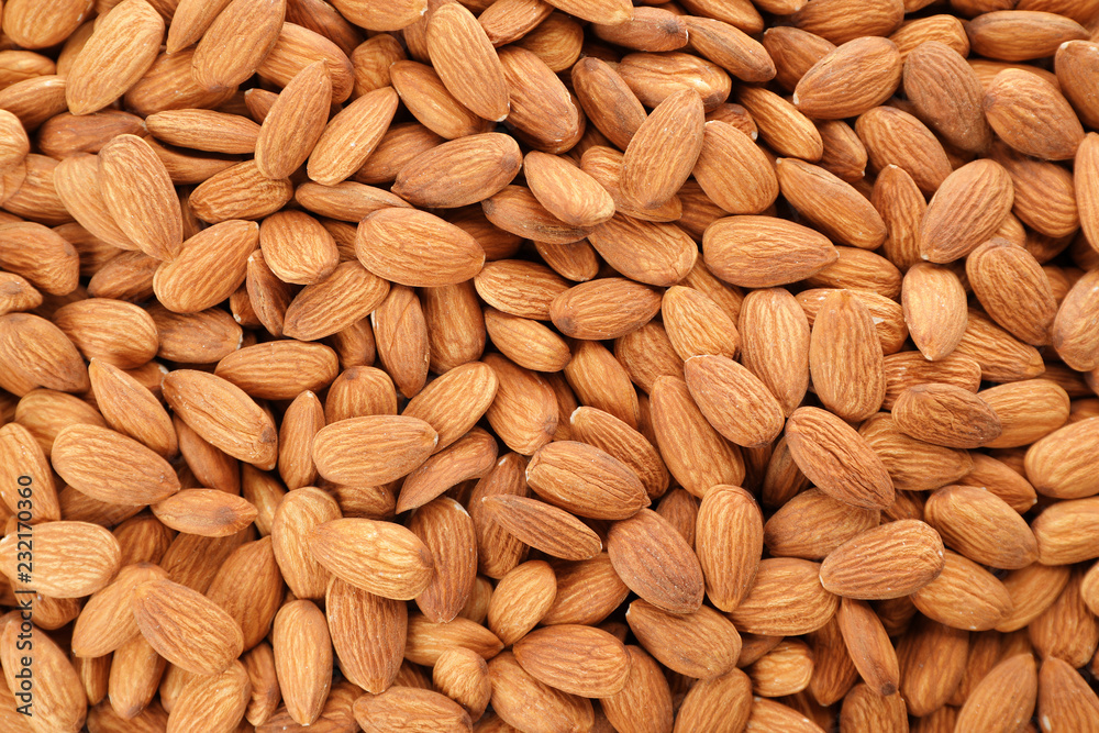 Organic almond nuts as background, top view. Healthy snack Organic almond nuts as background, top view. Healthy snack