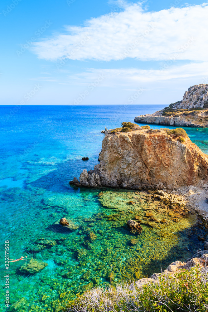 Bay with rocks on sea coast of Karpathos island near Ammopi village, Greece