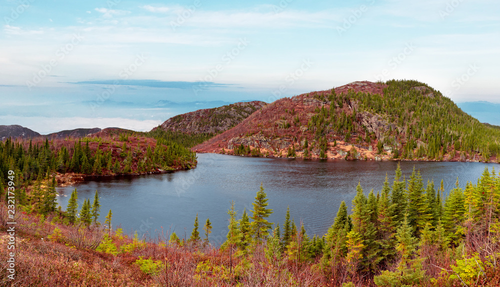 View of a lake in fall on the hiking trail ''Mont-du-Lac-des-Cygnes'' at Grand Jardin National Park, Québec
