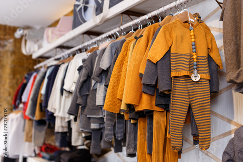 Stand with many baby costumes © JackF