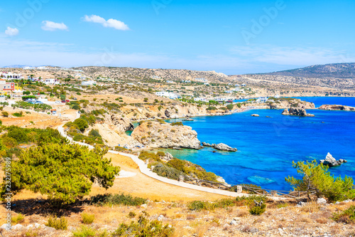 Coastal path along sea near Ammopi village, Karpathos island, Greece photo