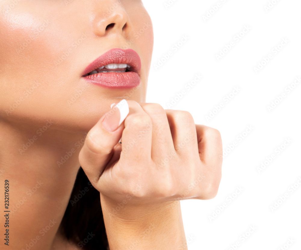 Closeup shot of part of female face and hand with manicured fingers, isolated on white background Closeup shot of part of female face and hand with manicured fingers, isolated on white background