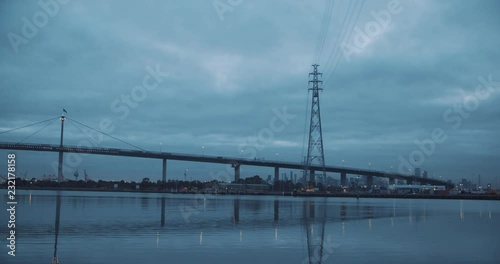 Westgate Bridge at sunrise on an overcast morning in Melbourne. photo