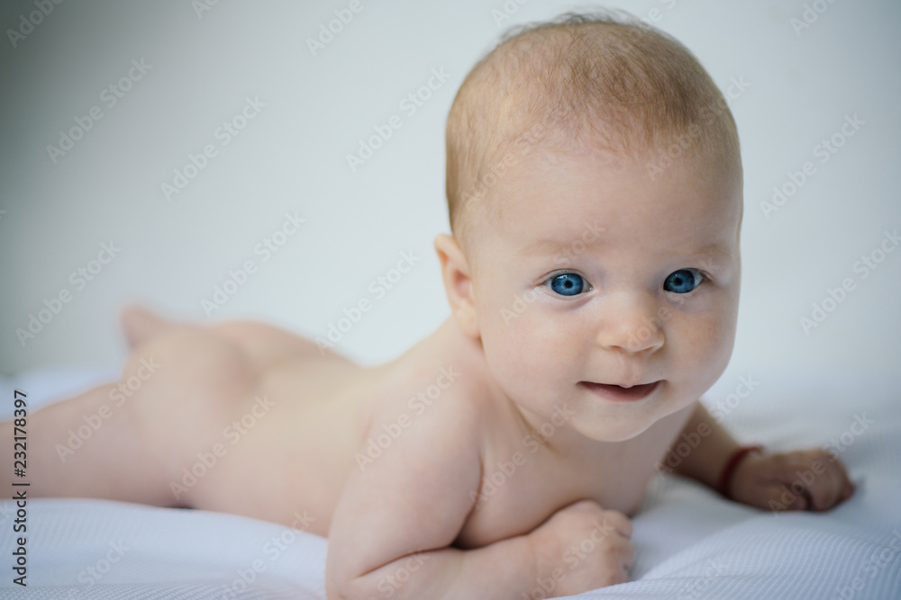 Newborn baby girl or boy. Motor skill activity of newborn. Child care. Happy baby enjoy play activity. Baby care and physical health. Happy childhood. Get your motor skills running Newborn baby girl or boy. Motor skill activity of newborn. Child care. Happy baby enjoy play activity. Baby care and physical health. Happy childhood. Get your motor skills running