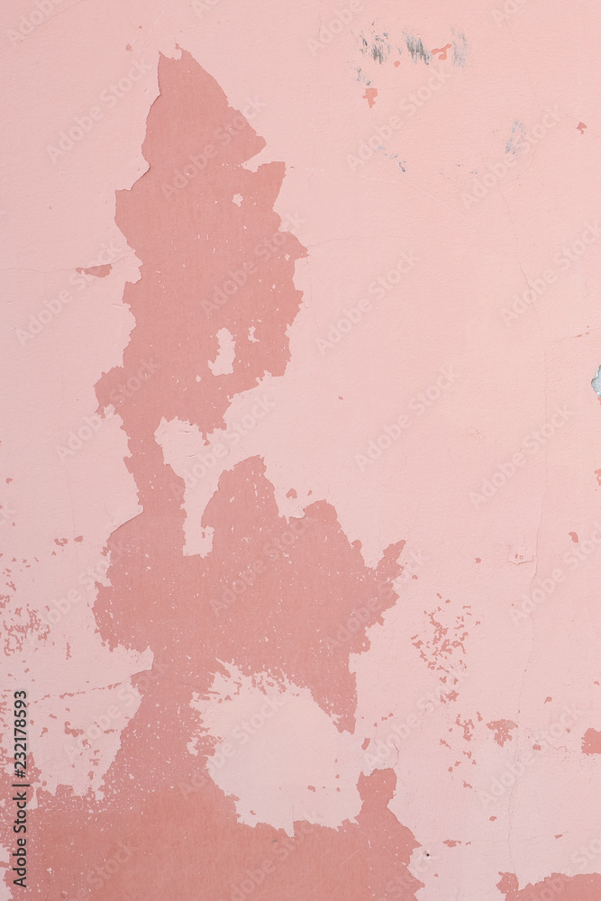 background pink wall with peeling paint, dark spots