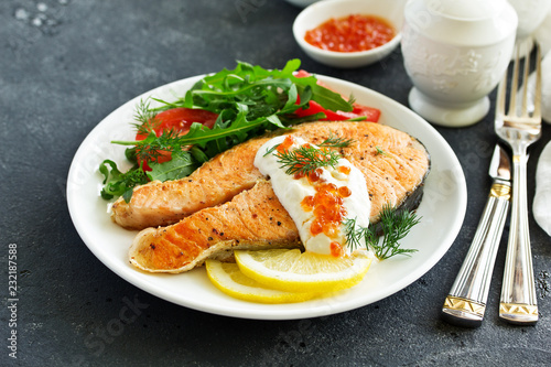 grilled salmon steak with cream sauce.