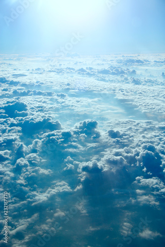 blue sky with white clouds. Flight over clouds. Celestial abyss