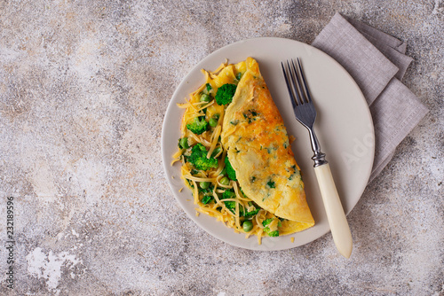 Omelette with green vegetable and cheese  photo