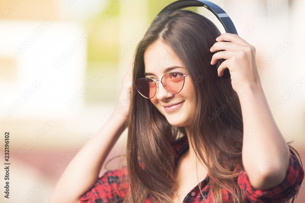 Teenage girl listening to the music