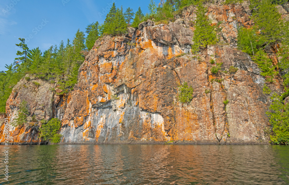 Colorful Cliffs Along  North Woods Lake