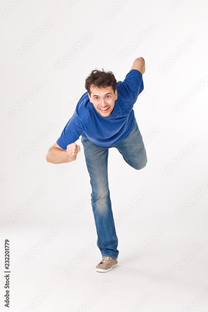 Joyful boy posing like running guy Joyful boy posing like running guy