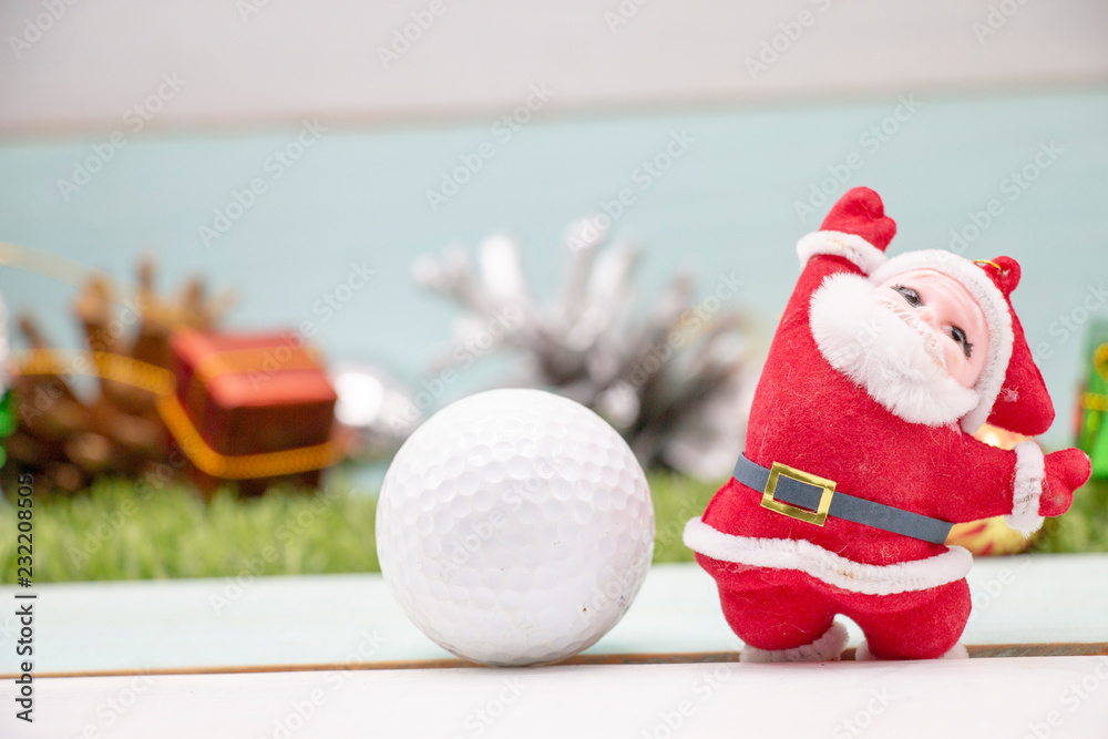 Fototapeta premium Merry Christmas to golfer with golf ball and Christmas ornament 
