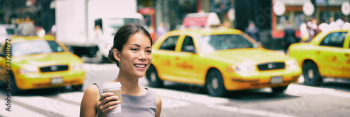 Fotótapéta New York city commute - Asian business woman walking to work in the morning commuting drinking coffee cup on NYC street with yellow cabs in the background banner