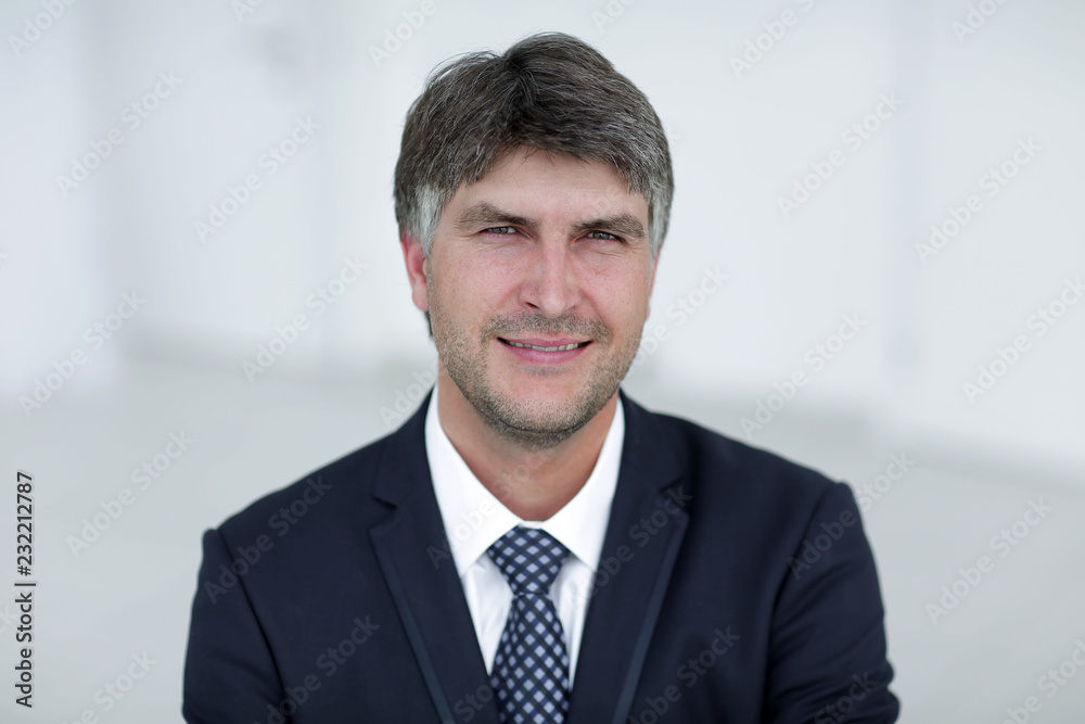 Portrait of a smiling successful businessman. Portrait of a smiling successful businessman.