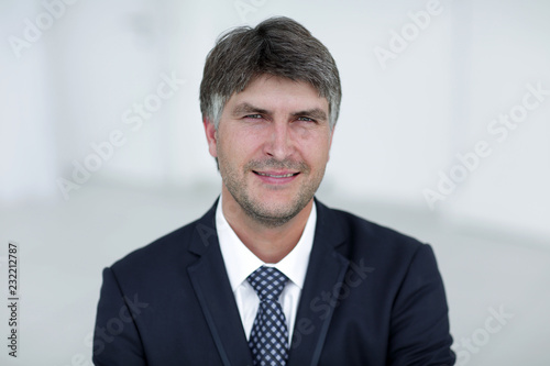 Portrait of a smiling successful businessman.