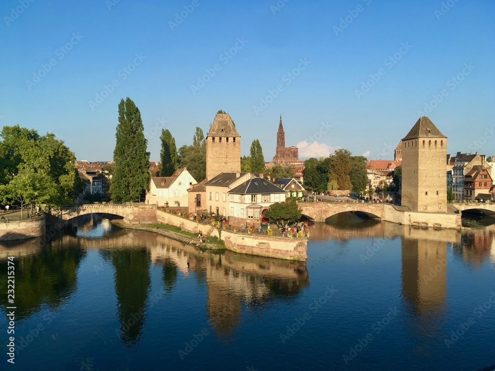 The City of Strasbourg from the lake of the city on a blue sky summer day, France