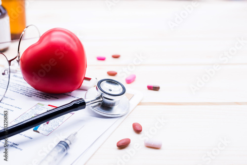 Health and care concept. Wellness and healthy. Physical examination and Heart Disease Checker photo