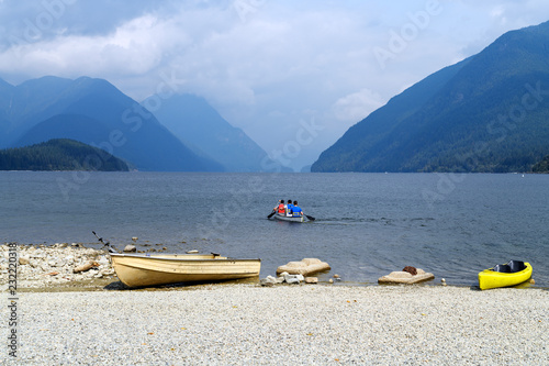 End of the summer, end of the season. The last kayakers on the Alouette Lake in Golden Ears Provincial Park in British Columbia, Canada photo