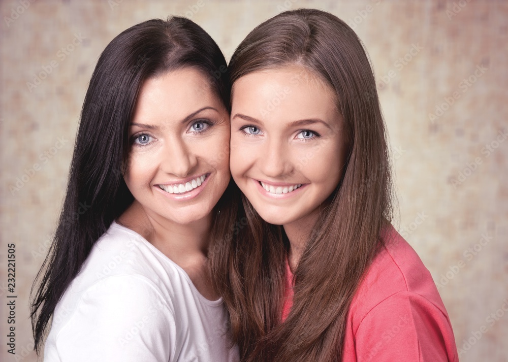 Happy Mother and daughter on background Happy Mother and daughter on background