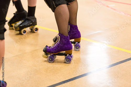 Roller derby players compete against each other