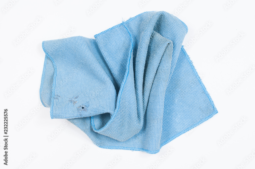 Blue folded microfiber cloth isolated on white background