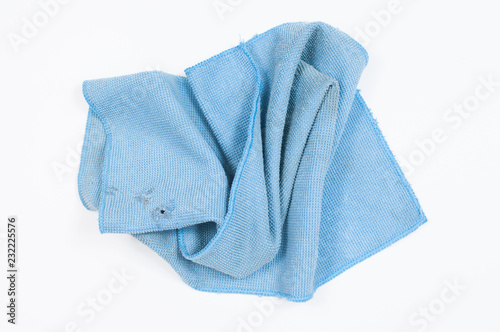 Blue folded microfiber cloth isolated on white background