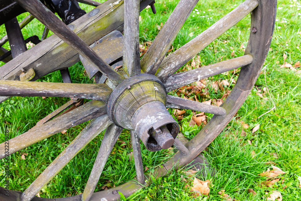 antique wooden cartwheel of an agricultural cart antique wooden cartwheel of an agricultural cart