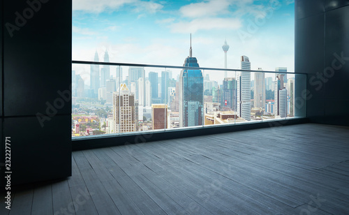 Photography Black wall and wood floor balcony with Kuala Lumpur city background