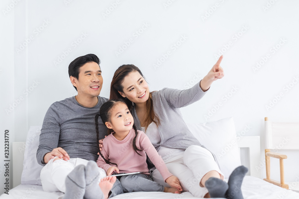 Portrait happy Asian family over white background Portrait happy Asian family over white background