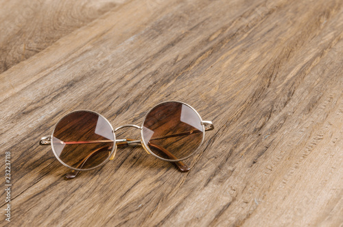 eyeglasses on wooden background