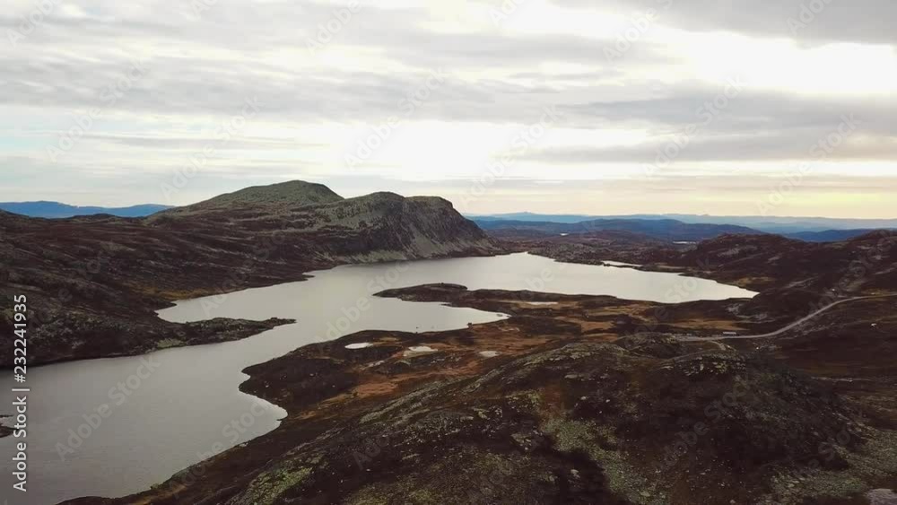 Aerial shot of mountain ridge Gaustatoppen and a big lake in Norway Aerial shot of mountain ridge Gaustatoppen and a big lake in Norway