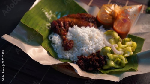 nasi lemak kukus with drumpstick malaysian local food